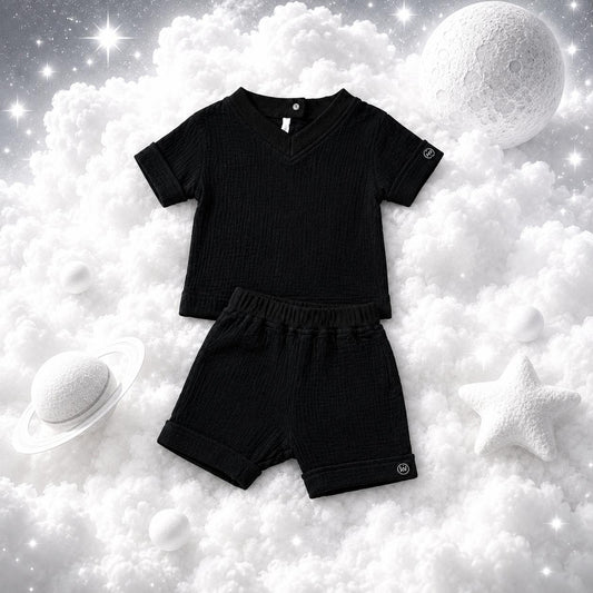 ECLIPSE baby T-shirt and shorts set — matching cotton outfit, flat lay, monochrome black
