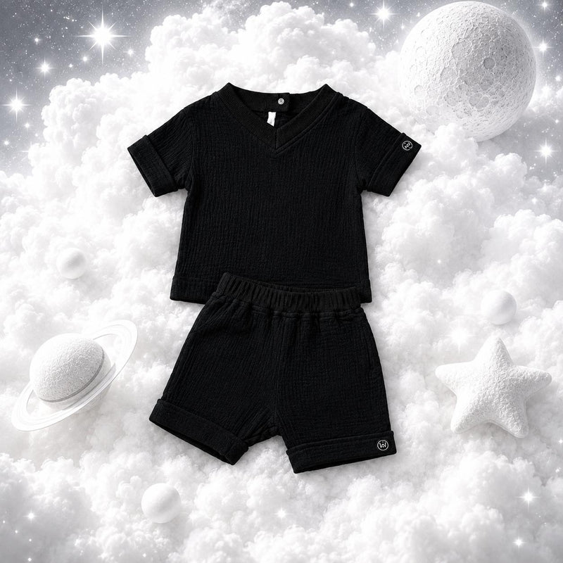 ECLIPSE baby T-shirt and shorts set — matching cotton outfit, flat lay, monochrome black
