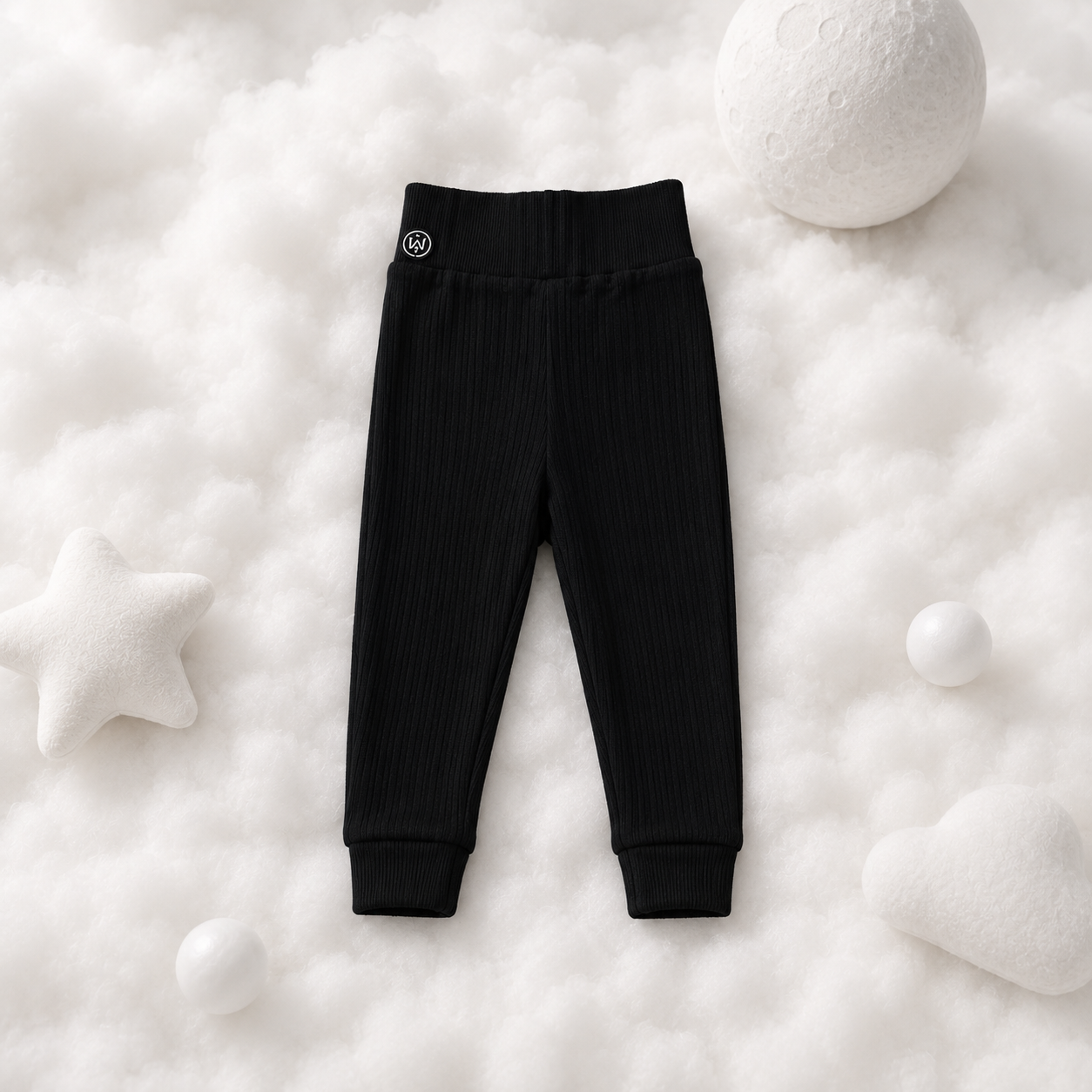 ECLIPSE baby lounge PJ pants in black — tapered fit, ribbed ankle cuffs, flat lay