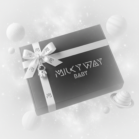  MILKY WAY BABY gift box — black luxury packaging with branded white ribbon, astronaut charm and celestial motif
