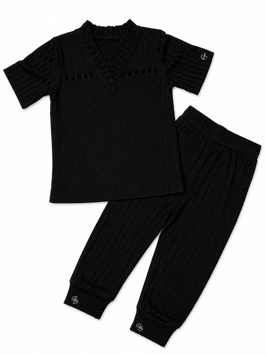 ECLIPSE baby lounge set — top and pants styled together, monochrome black